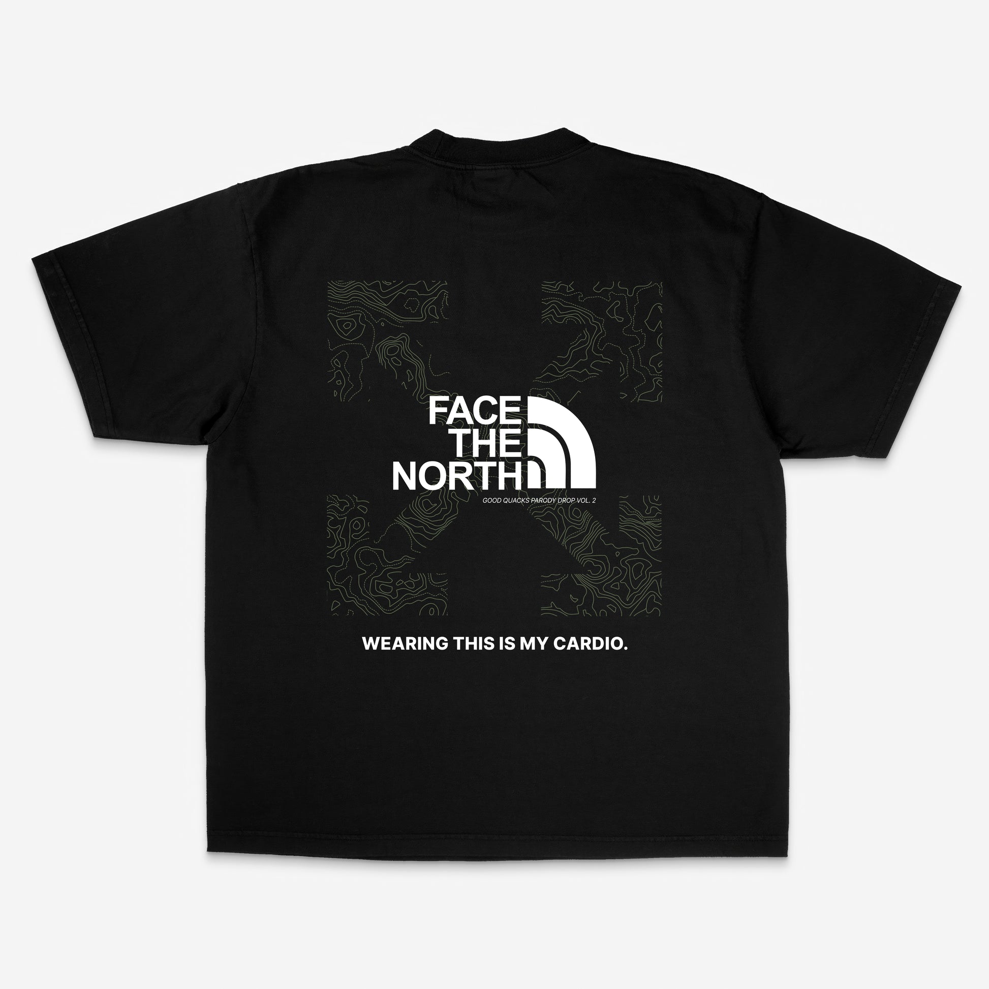 Text-based design featuring “FACE THE NORTH” in bold white letters with parody logo, on a black background. Minimalist sarcasm from Good Quacks Parody Drop Vol. 2.